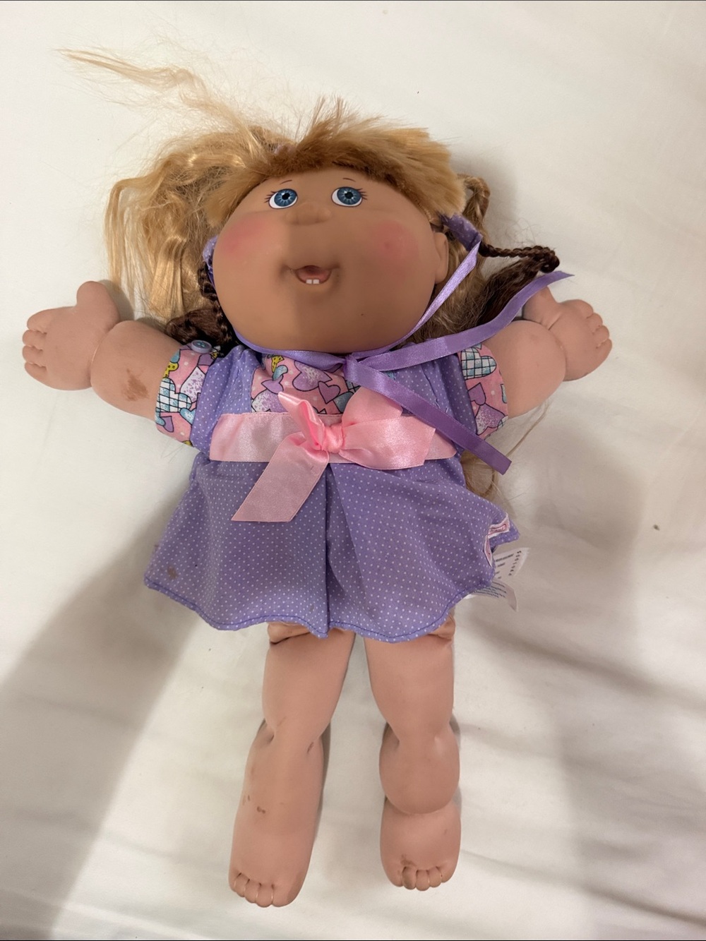 CABBAGE PATCH KIDS Plush Purple Dress Baby Doll with brown hair braided headband